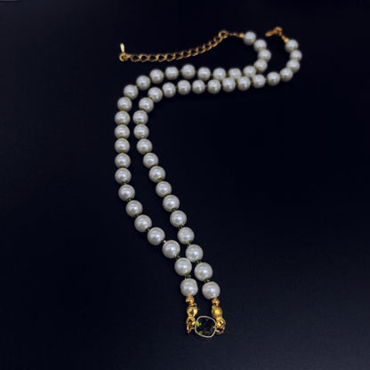 Elegant Pearl Necklace with Green Crystal Accent