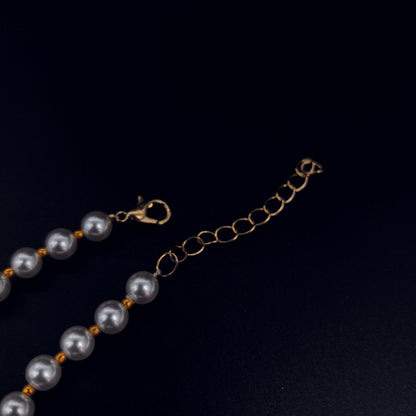 Handcrafted Pearl Bracelet with Gold Flower Pendant