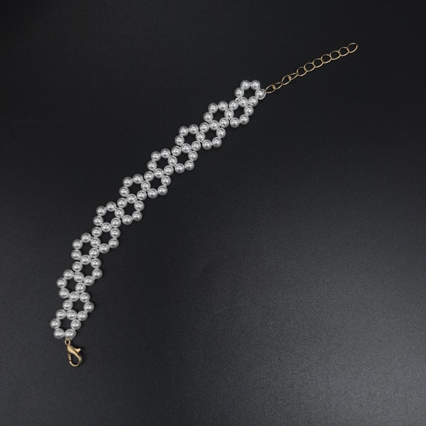Handcrafted Multi-Row Pearl Bracelet with Gold Chain Detail