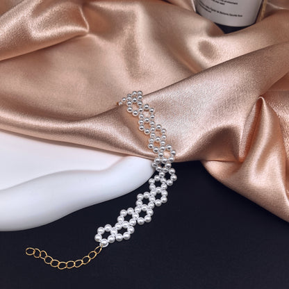 Handcrafted Multi-Row Pearl Bracelet with Gold Chain Detail