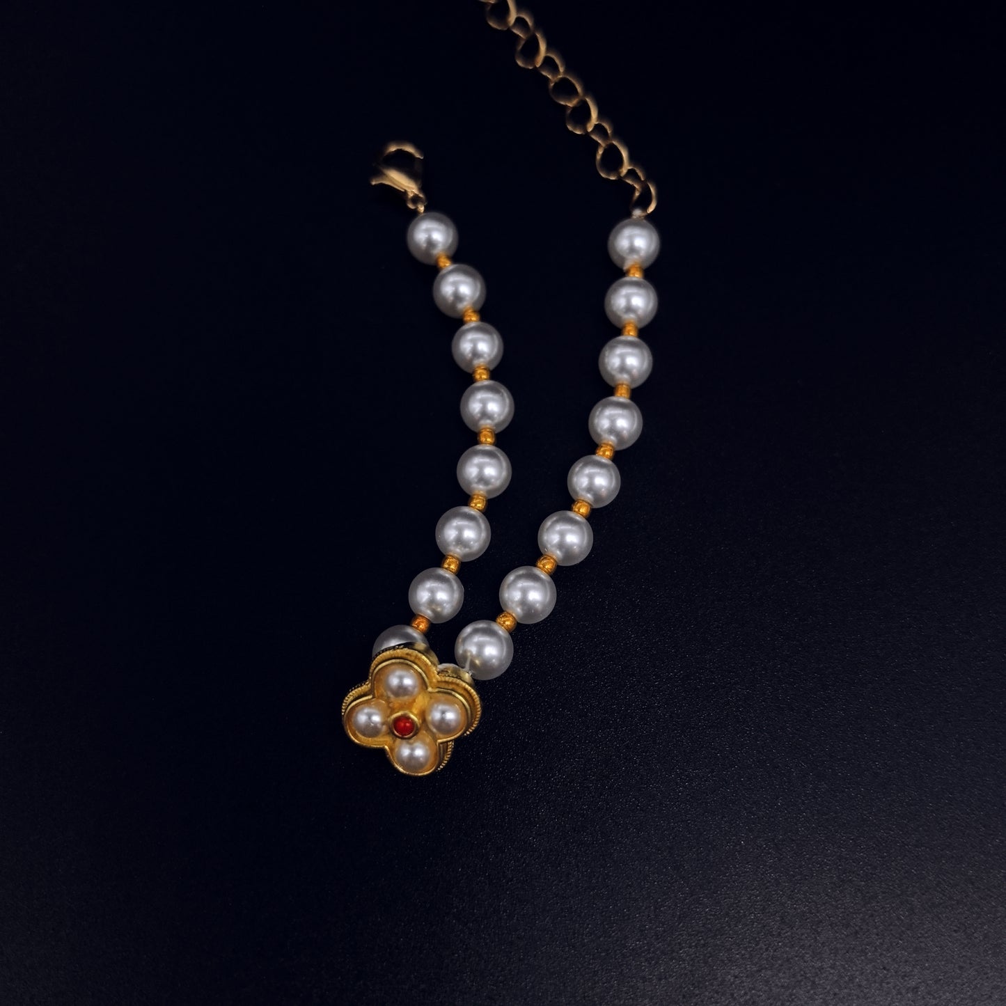 Handcrafted Pearl Bracelet with Gold Flower Pendant