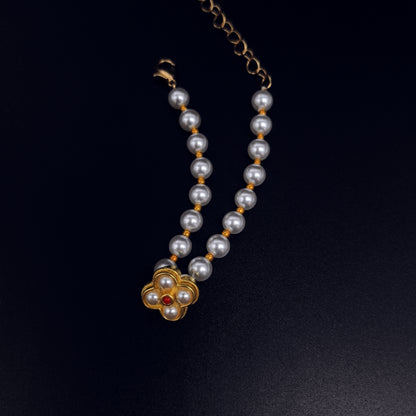 Handcrafted Pearl Bracelet with Gold Flower Pendant