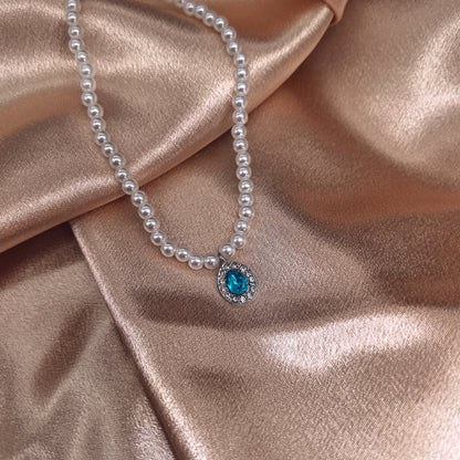 Elegant Pearl Necklace with Blue Crystal Pendant