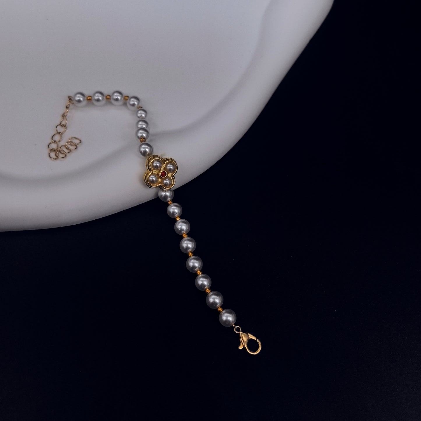Handcrafted Pearl Bracelet with Gold Flower Pendant