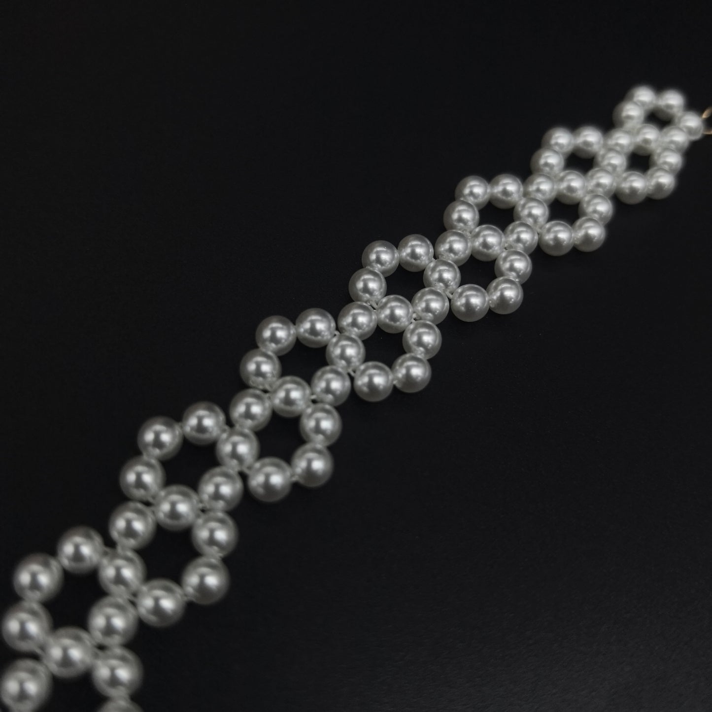 Handcrafted Multi-Row Pearl Bracelet with Gold Chain Detail