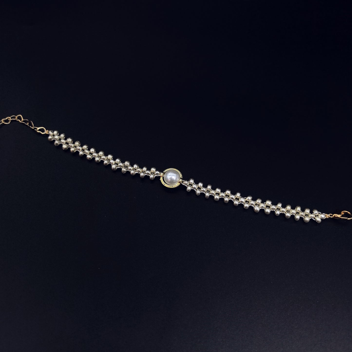 Elegant Handcrafted Pearl and Bead Bracelet