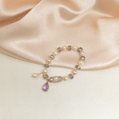 Pearl and Crystal Bracelet with Purple Teardrop Pendant