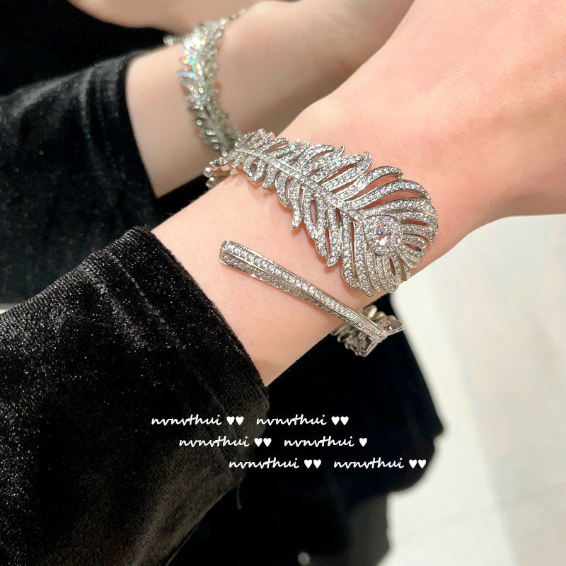 Feather and Teardrop Design Jewelry Set - Handcrafted Bracelet, Ring, and Earrings