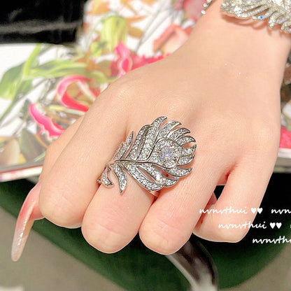 Feather and Teardrop Design Jewelry Set - Handcrafted Bracelet, Ring, and Earrings