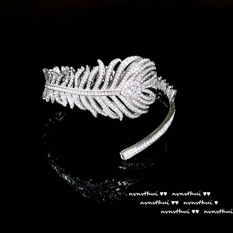 Feather and Teardrop Design Jewelry Set - Handcrafted Bracelet, Ring, and Earrings