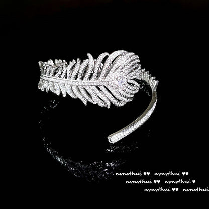 Feather and Teardrop Design Jewelry Set - Handcrafted Bracelet, Ring, and Earrings