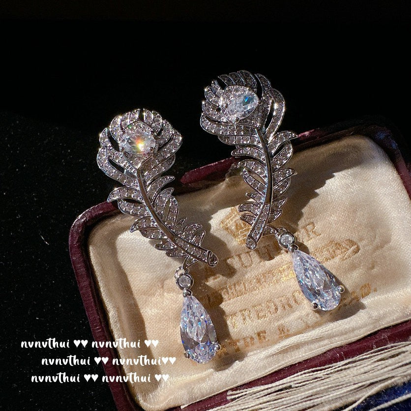 Feather and Teardrop Design Jewelry Set - Handcrafted Bracelet, Ring, and Earrings