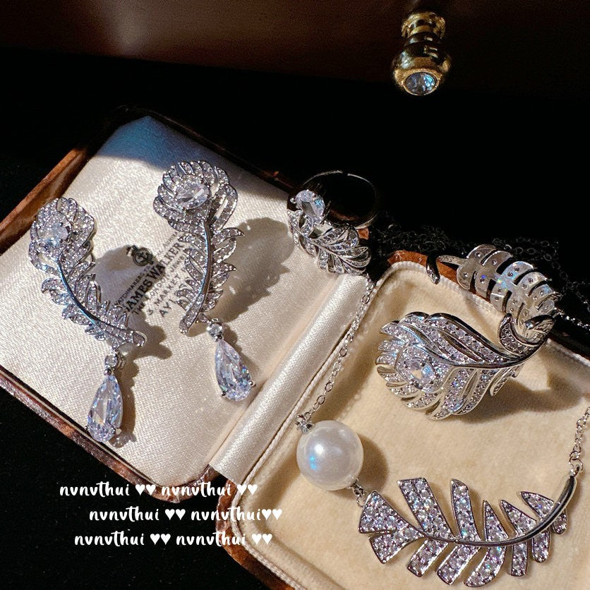 Feather and Teardrop Design Jewelry Set - Handcrafted Bracelet, Ring, and Earrings