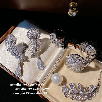 Feather and Teardrop Design Jewelry Set - Handcrafted Bracelet, Ring, and Earrings