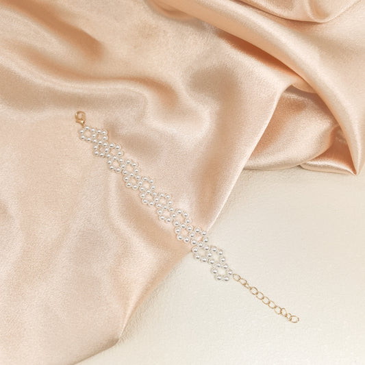 Handcrafted Multi-Row Pearl Bracelet with Gold Chain Detail