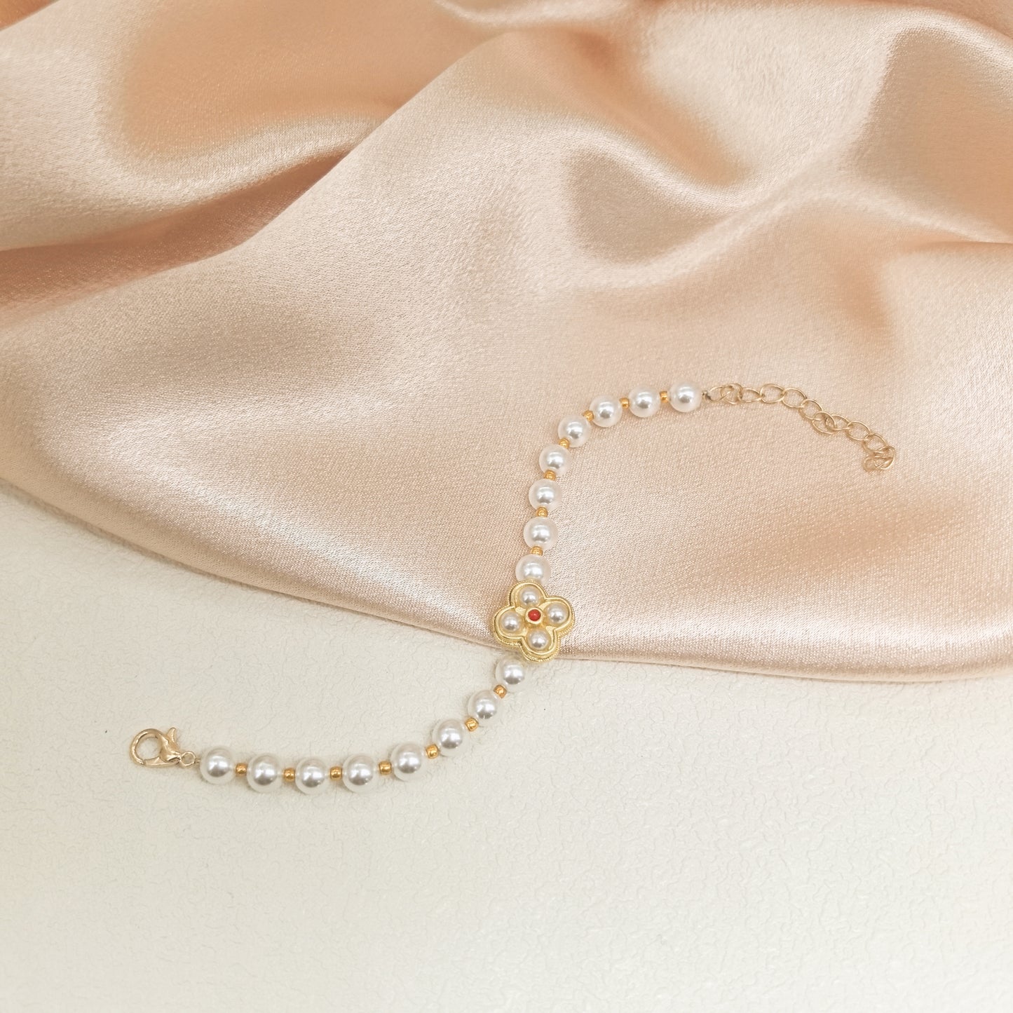 Handcrafted Pearl Bracelet with Gold Flower Pendant