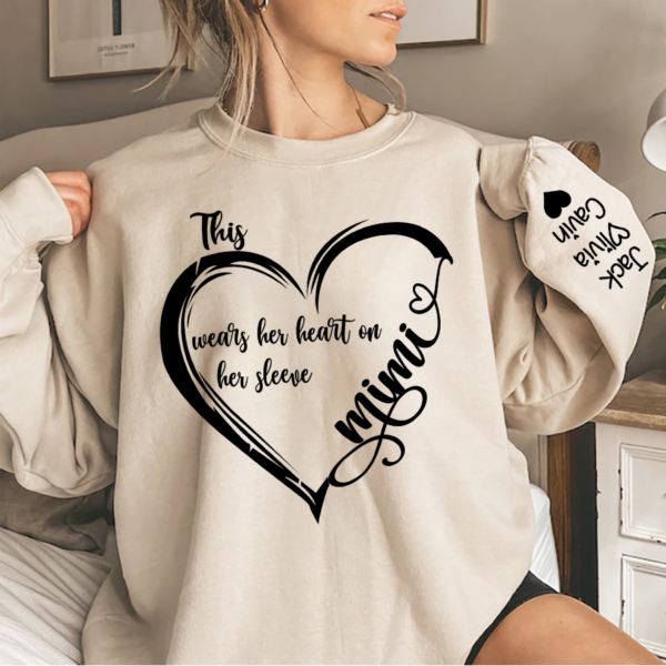 Personalized Grandma Heart Sweatshirt. Custom This Grandma Wears Her Heart On Her Sleeve With Grandkids Sweatshirt